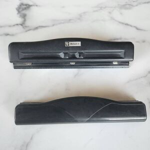 Two black hole punchers plastic metal mutual homeschool business office accessor